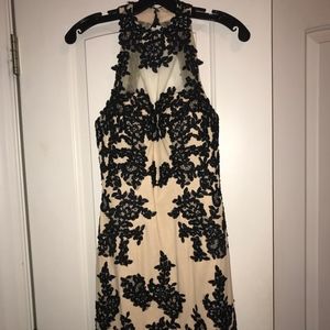 Short sleeveless formal dress w/ halter neck